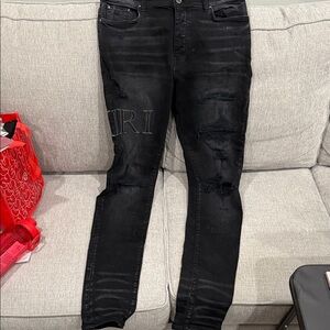 AMIRI Black Distressed Skinny Jeans